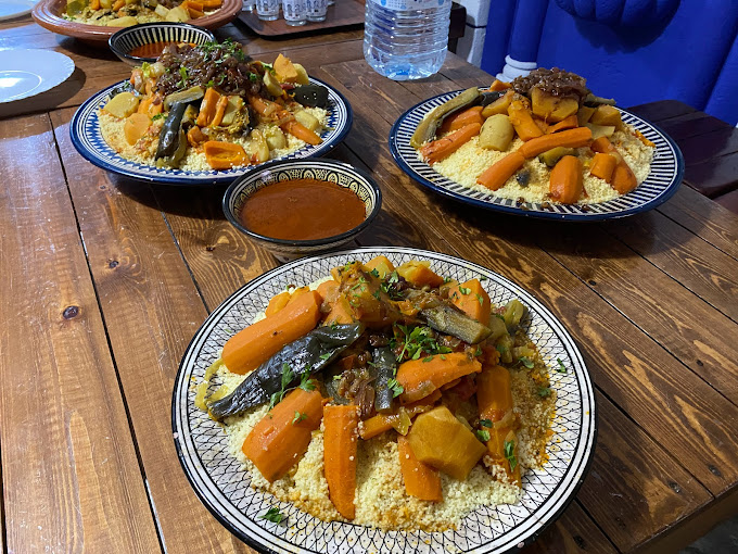 ZenithKite students exploring Essaouira's blue and white medina after kitesurfing session