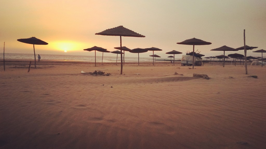 Experienced kitesurfer performing jump at Sidi Kaouki with ZenithKite Essaouira